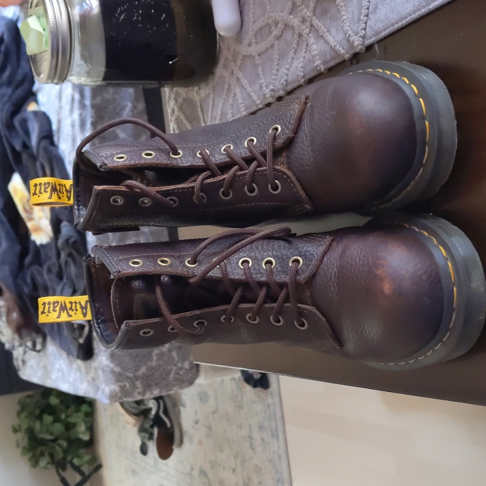 Dr. Martens steel toe boots.